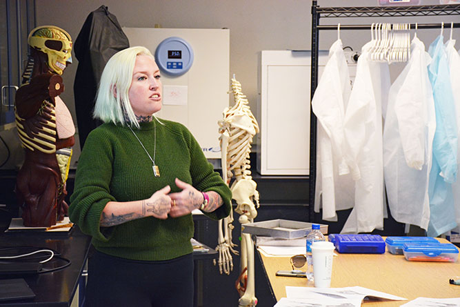 In this November 2022 file photo, UNM-Gallup Lecturer II Skyler Stevens teaches a science class in Calvin Hall Center.