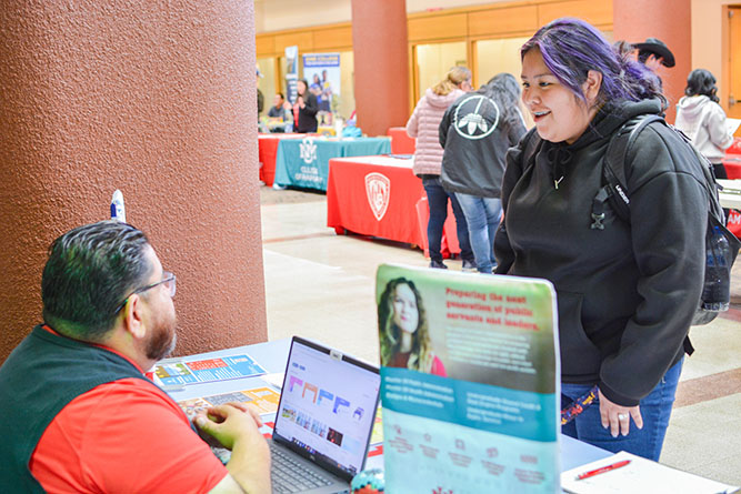 In this Oct. 16, 2024, file photo, a student participates in the College Transfer & Scholarship Fair in the Gurley Hall Commons at The University of New Mexico-Gallup.