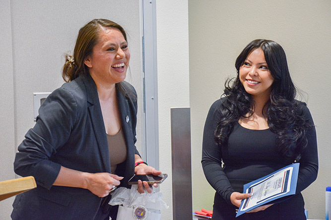 Gallup Police Sgt. Nicola Martinez-Collins talkes about UNM-Gallup alum Amy Anderson's internship experience during a celebration luncheon at the police department on May 6, 2025.