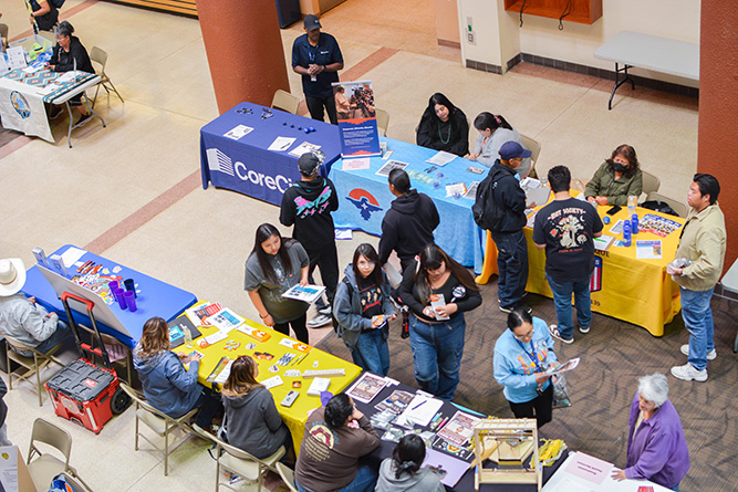 Students and community members speak to area employers during the Spring 2025 Job Fair at The University of New Mexico-Gallup on May, 14, 2025.
