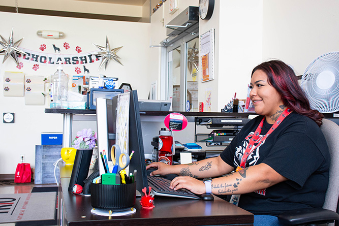 Peer tutor/mentor Nakeisha Begaye works the front desk of TRIO Student Support Services at The University of New Mexico-Gallup on July 18, 2025.