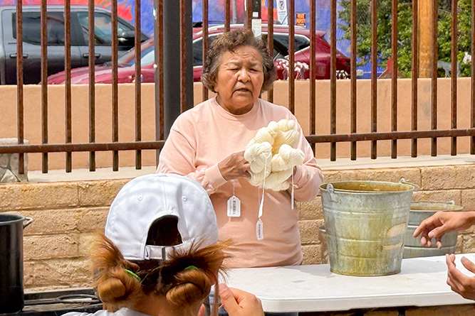 Navajo weaving instructor Gloria Begay gives a lecture before her demonstration in downtown Gallup on Friday, April 10, 2026.