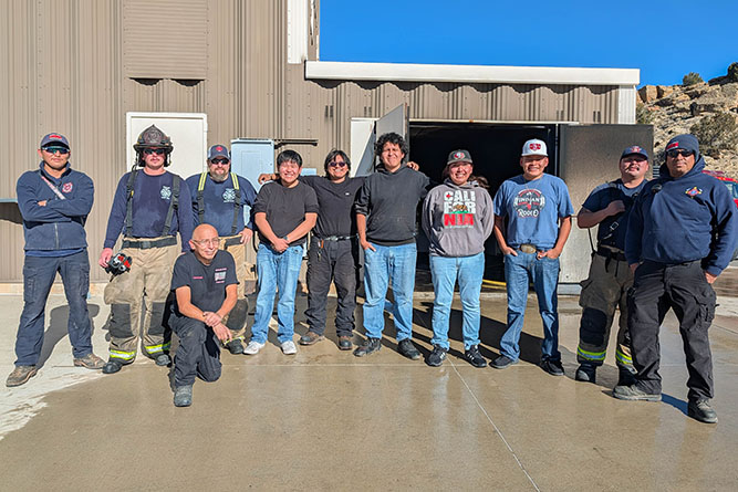 UNM-Gallup Center for Career and Technical Education students pose for a photo with McKinley County fire personnel at the McKinley County Fire Office in Gallup.
