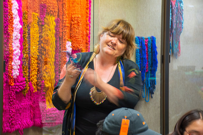 Fiber artist Leigh Oviatt, of Santa Fe, leads a fiber workshop outside the Ingham Chapman Gallery at The University of New Mexico-Gallup on March 26, 2026.