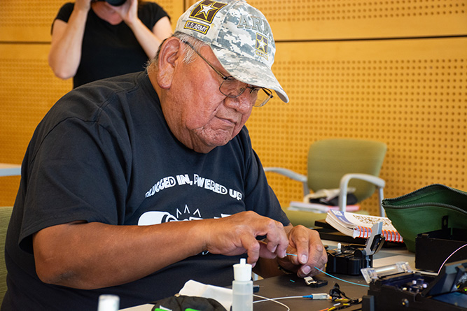 Student Melvin Sanderson Jr. works on a fusion splicing exercise during the Fiber Optic Bootcamp at The University of New Mexico-Gallup on Friday, June 12, 2026.