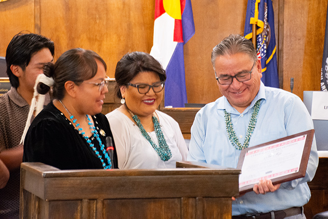 UNM-Gallup Interim Dean of Instruction Joe Kee receives a certificate of recognition inthe Navajo Nation Council Chambers in Window Rock, Arizona, on Wednesday, July 22, 2026.