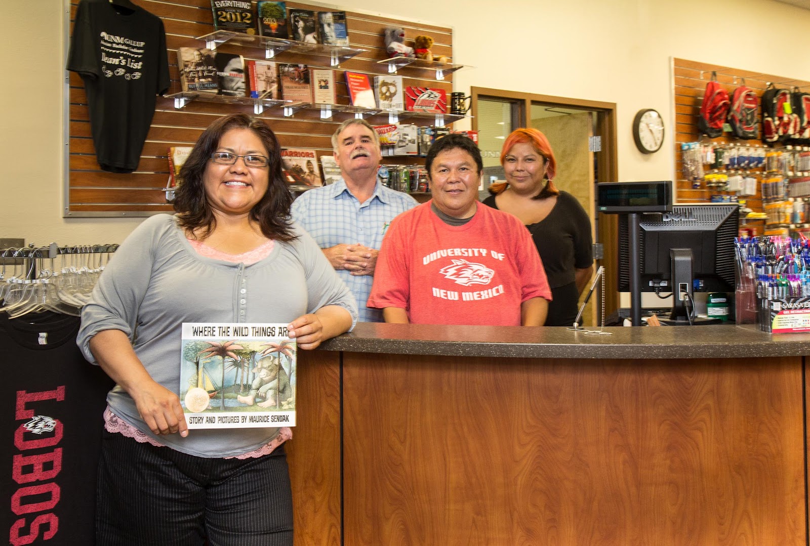 From left, College Store manager Rose Adakai, and staff Lin Comer, Jack Askin and Angie Hood.