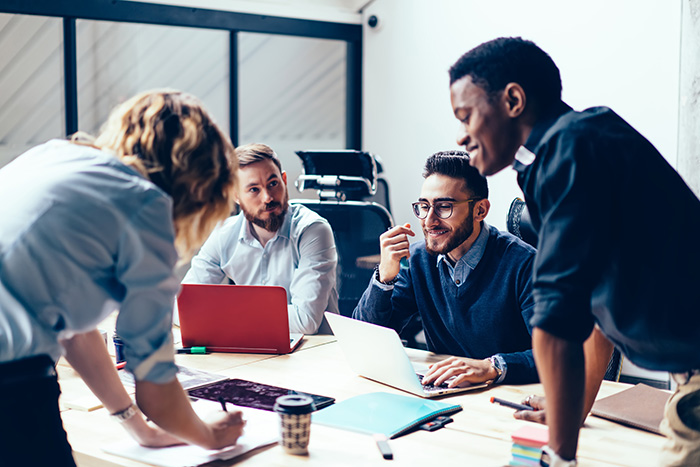 group of people in a team meeting