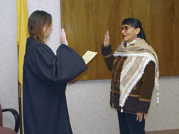 McKinley County Judge Linda Padilla, left, swears in new UNM-Gallup Local Board member Gloria Skeet.